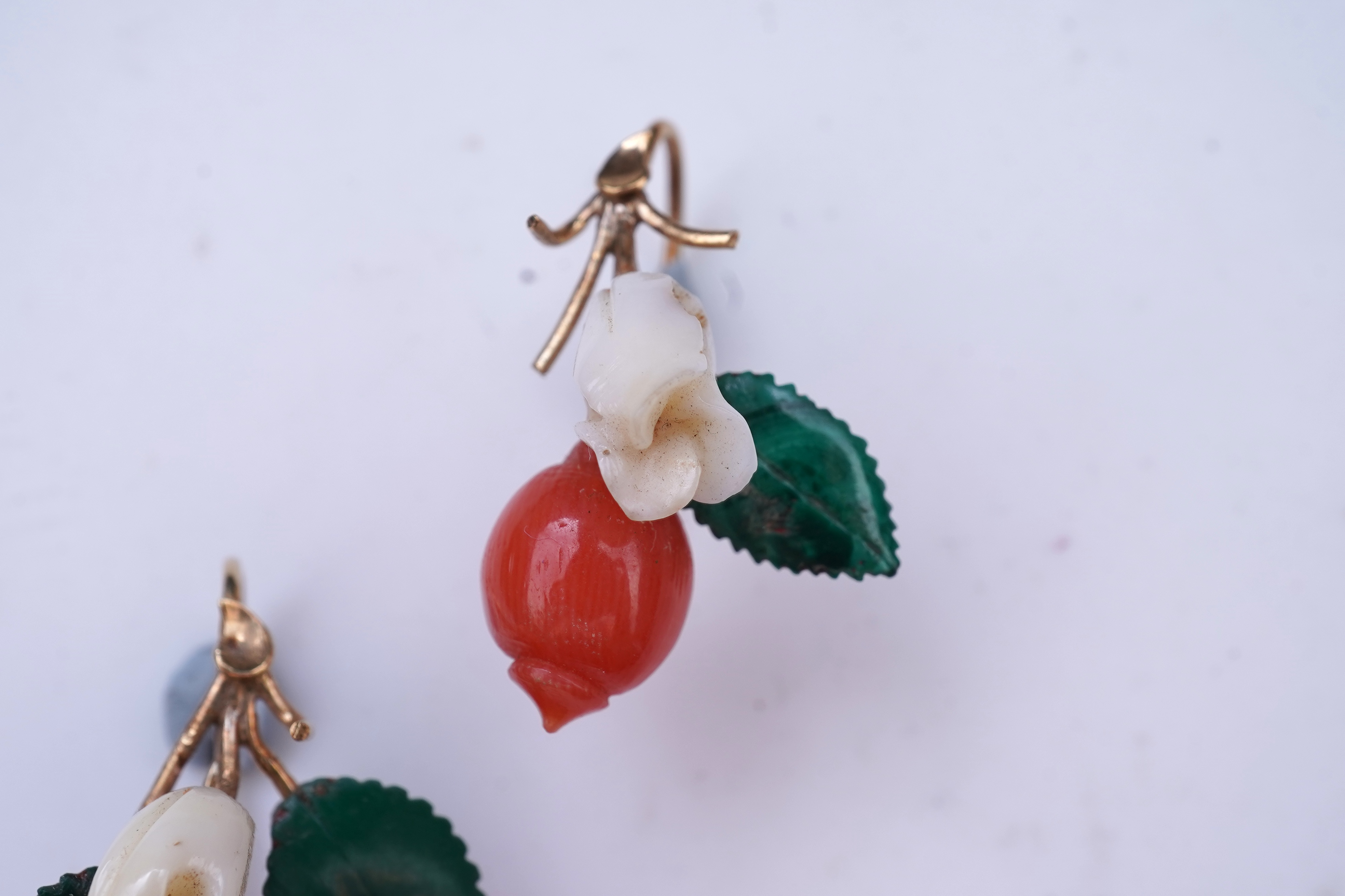 A rare coral and malachite demi-parure, mid 19th century and later